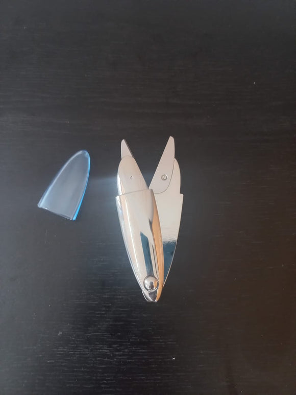 Silver scissors with blue lid