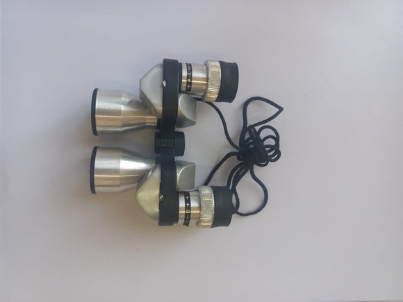 Silver opera binoculars with cleaning cloth