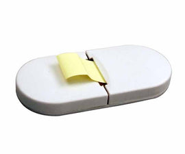 White sticky note dispenser (sticky notes included)