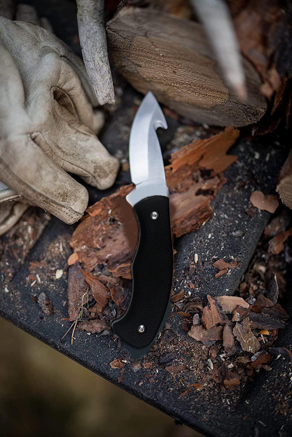 Black hunting knife with hook and nylon sheath
